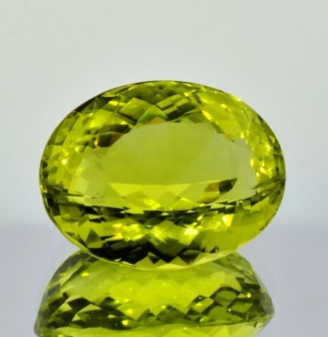 Lemon-Quarz, Oval facettiert (23,29 ct.) aus Brasilien (Goiás, Ouro Verde) Lemon-Quarz, Oval facettiert (23,29 ct.) aus Brasilien (Goiás, Ouro Verde)